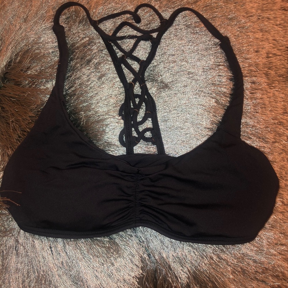 Dark blue bathing suit top.
